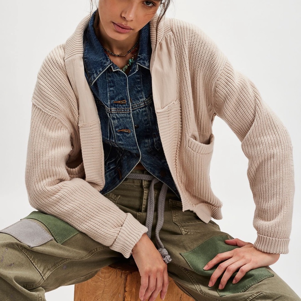 We the Free cardigan in a creamy color.